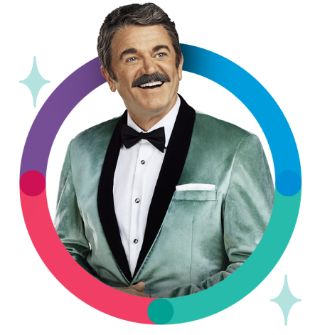 Man with mustache and tuxedo smiling up in multi-colored circle